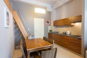 Фото номера One-Bedroom Apartment with Living Room and Mezzanine Апартаменты Apartamenty Brzozowa - Centrum г. Закопане 4