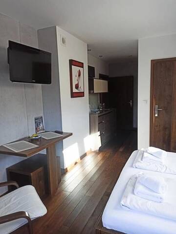 Фото номера Номер-студио с видом на горы (для 2 взрослых) Апартаменты Apartamenty Grunwaldzka г. Закопане 2