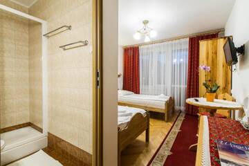 Фото номера Двухместный номер с 2 отдельными кроватями Отель Hotel PRL RZEMIEŚLNIK г. Закопане 17