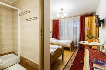 Фото номера Двухместный номер с 2 отдельными кроватями Отель Hotel PRL RZEMIEŚLNIK г. Закопане 3