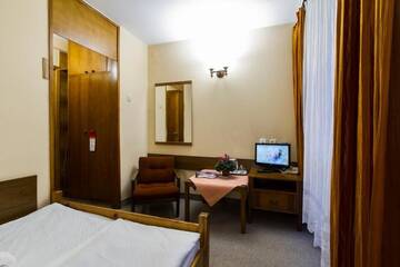 Фото номера Двухместный номер Делюкс с 1 кроватью Отель Hotel PRL RZEMIEŚLNIK г. Закопане 4