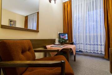 Фото номера Двухместный номер Делюкс с 1 кроватью Отель Hotel PRL RZEMIEŚLNIK г. Закопане 7