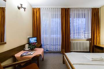 Фото номера Двухместный номер Делюкс с 1 кроватью Отель Hotel PRL RZEMIEŚLNIK г. Закопане 2