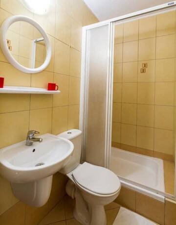 Фото номера Двухместный номер с 2 отдельными кроватями Отель Hotel PRL RZEMIEŚLNIK г. Закопане 22