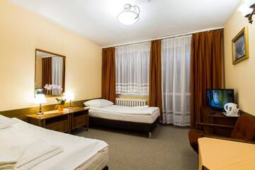 Фото номера Двухместный номер Делюкс с 2 отдельными кроватями Отель Hotel PRL RZEMIEŚLNIK г. Закопане 2