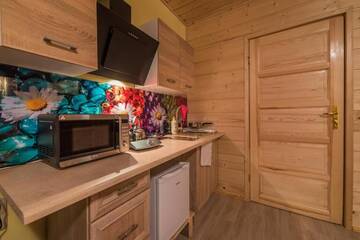 Фото номера Трехместный номер с мини-кухней Отели типа «постель и завтрак» Apartamenty i pokoje gościnne Nowita г. Закопане 6
