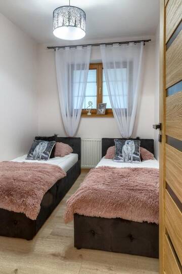 Фото номера Люкс с 2 спальнями и диваном-кроватью Апартаменты Apartamenty Tatrzańskie Turnie г. Закопане 8