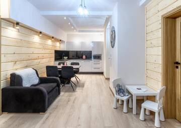 Фото номера Люкс с 2 спальнями и диваном-кроватью Апартаменты Apartamenty Tatrzańskie Turnie г. Закопане 9