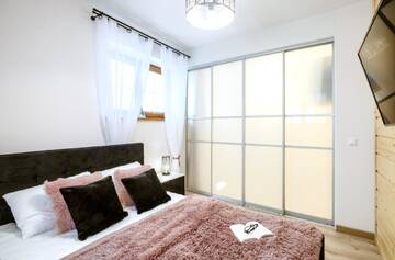 Фото номера Люкс с 2 спальнями и диваном-кроватью Апартаменты Apartamenty Tatrzańskie Turnie г. Закопане 5