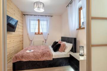 Фото номера Люкс с 2 спальнями и диваном-кроватью Апартаменты Apartamenty Tatrzańskie Turnie г. Закопане 3