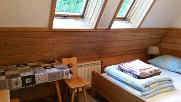 Фото номера Двухместный номер с 1 кроватью Проживание в семье Camping Harenda Pokoje Gościnne i Domki г. Закопане 7