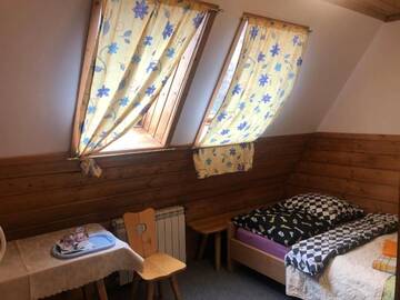 Фото номера Двухместный номер с 1 кроватью Проживание в семье Camping Harenda Pokoje Gościnne i Domki г. Закопане 5