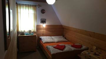 Фото номера Двухместный номер с 1 кроватью Проживание в семье Camping Harenda Pokoje Gościnne i Domki г. Закопане 9
