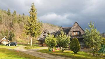 Фото номера Двухместный номер с 1 кроватью Проживание в семье Camping Harenda Pokoje Gościnne i Domki г. Закопане 13