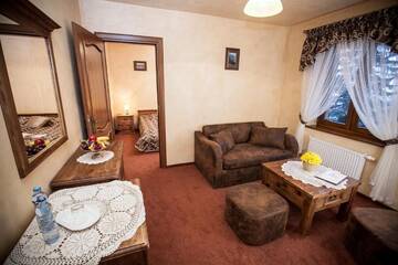 Фото номера Двухместный номер Делюкс с 1 кроватью Отель Hotel Dwór Karolówka г. Закопане 12