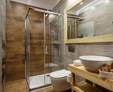 Фото номера Трехместный номер Отели типа «постель и завтрак» Villa Vita г. Закопане 12