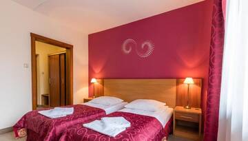 Фото номера Стандартный двухместный номер с 2 отдельными кроватями Отель Hotel Boruta г. Закопане 13