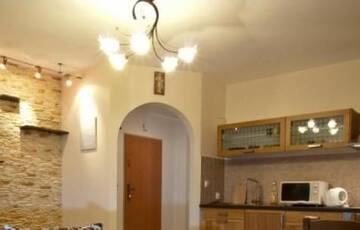 Фото номера Апартаменты с 2 спальнями и балконом Апартаменты Apartamenty Skaldowie г. Закопане 8