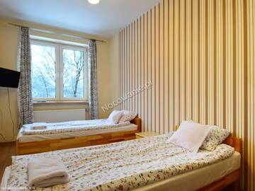 Фото номера Апартаменты с 2 спальнями и балконом Апартаменты Apartamenty Skaldowie г. Закопане 6