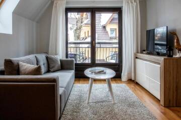 Фото номера Двухуровневые апартаменты № 38 Апартаменты Apartamenty Bulwary 25 г. Закопане 9