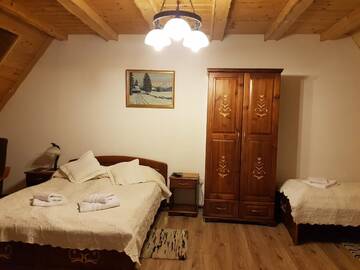 Фото номера Трехместный номер Мини-отель Magnat Inn г. Закопане 4