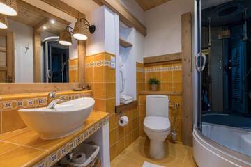 Фото номера Семейные апартаменты Делюкс Апарт-отели Bambi Cottage г. Закопане 12