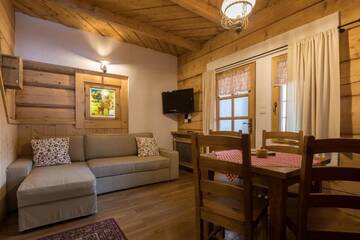 Фото номера Семейные апартаменты Делюкс Апарт-отели Bambi Cottage г. Закопане 10