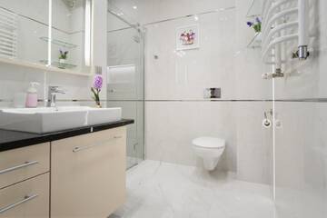 Фото номера Люкс с кроватью размера «king-size» и балконом Апартаменты Aqua Park Residence г. Закопане 4