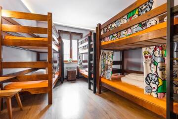 Фото номера Cемейный номер с собственной ванной комнатой Хостелы Top Hostel Pokoje Gościnne г. Закопане 4