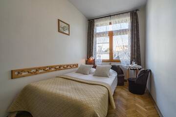 Фото номера Двухместный номер с 1 кроватью Апартаменты Pokoje i Apartamenty Krupówki 36 г. Закопане 21