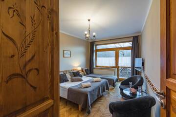 Фото номера Трехместный номер Апартаменты Pokoje i Apartamenty Krupówki 36 г. Закопане 14