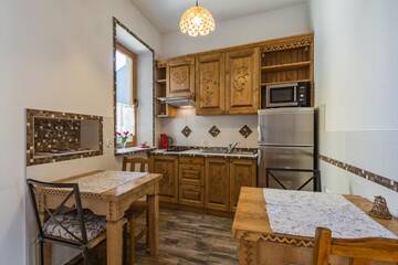 Фото номера Апартаменты с балконом Апартаменты Pokoje i Apartamenty Krupówki 36 г. Закопане 12