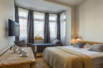 Фото номера Трехместный номер Апартаменты Pokoje i Apartamenty Krupówki 36 г. Закопане 21