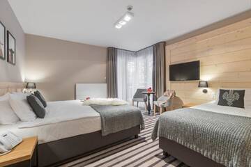 Фото номера Трехместный номер Отель Hotel Foluszowy Potok г. Закопане 5