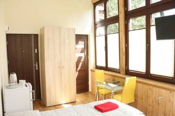 Фото номера Двухместный номер с 2 отдельными кроватями Апартаменты Gimnazjalna 5 - Apartamenty i pokoje w Centrum Zakopanego г. Закопане 11