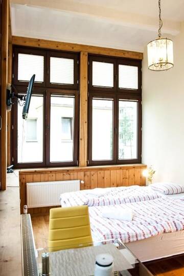 Фото номера Двухместный номер с 2 отдельными кроватями Апартаменты Gimnazjalna 5 - Apartamenty i pokoje w Centrum Zakopanego г. Закопане 21