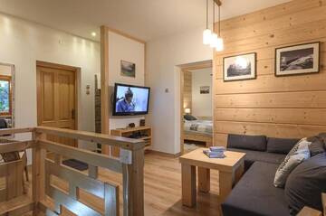 Фото номера Апартаменты с террасой Апартаменты Apartament pod Skocznią г. Закопане 30