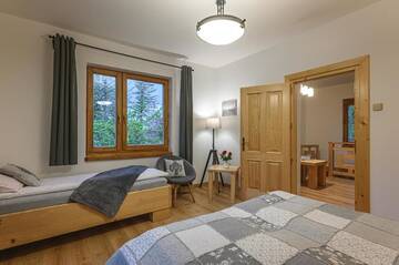 Фото номера Апартаменты с террасой Апартаменты Apartament pod Skocznią г. Закопане 38