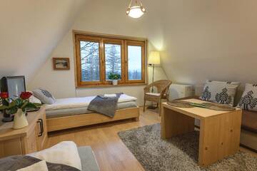 Фото номера Трехместный номер с ванной комнатой Апартаменты Apartament pod Skocznią г. Закопане 4