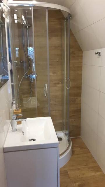 Фото номера Трехместный номер с ванной комнатой Апартаменты Apartament pod Skocznią г. Закопане 10