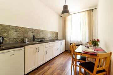 Фото номера Апартаменты Делюкс с балконом Апартаменты Apartamenty Krupówki 4 г. Закопане 22