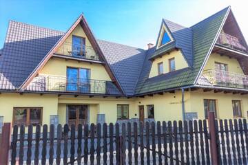 Фото номера Двухместный номер с 1 кроватью и балконом Проживание в семье Willa Cyrek г. Закопане 5