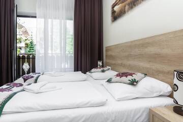 Фото номера Трехместный номер Делюкс Отель RentPlanet - Hotel Nosal г. Закопане 8