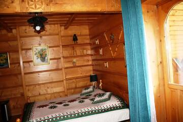 Фото номера Четырехместный номер Апартаменты Holiday Home Krzysztoforow г. Закопане 4