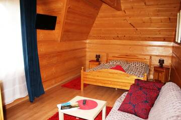 Фото номера Апартаменты с балконом Апартаменты Holiday Home Krzysztoforow г. Закопане 2