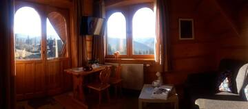 Фото номера Четырехместный номер Апартаменты Holiday Home Krzysztoforow г. Закопане 11
