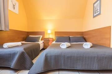 Фото номера Трехместный номер Отели типа «постель и завтрак» Liberta INN - Pokoje Gościnne г. Закопане 5