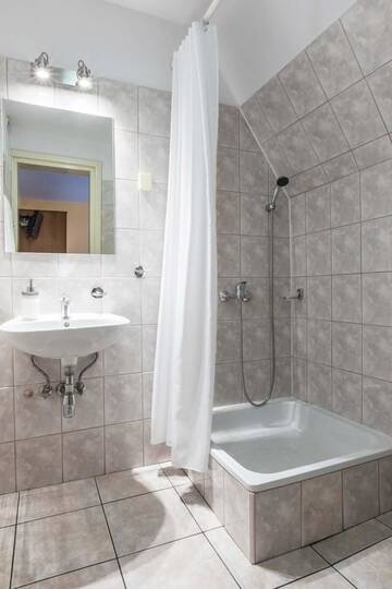 Фото номера Двухместный номер с 1 кроватью Отели типа «постель и завтрак» Liberta INN - Pokoje Gościnne г. Закопане 7