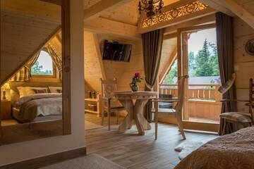 Фото номера Полулюкс с видом на горы Апарт-отели Aparthotel Bambi г. Закопане 11