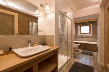 Фото номера Семейный люкс с видом на горы Апарт-отели Aparthotel Bambi г. Закопане 11